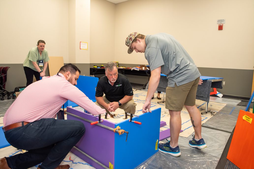 COAA Cares Happy Wheels Cart being built featuring Bobby Brown