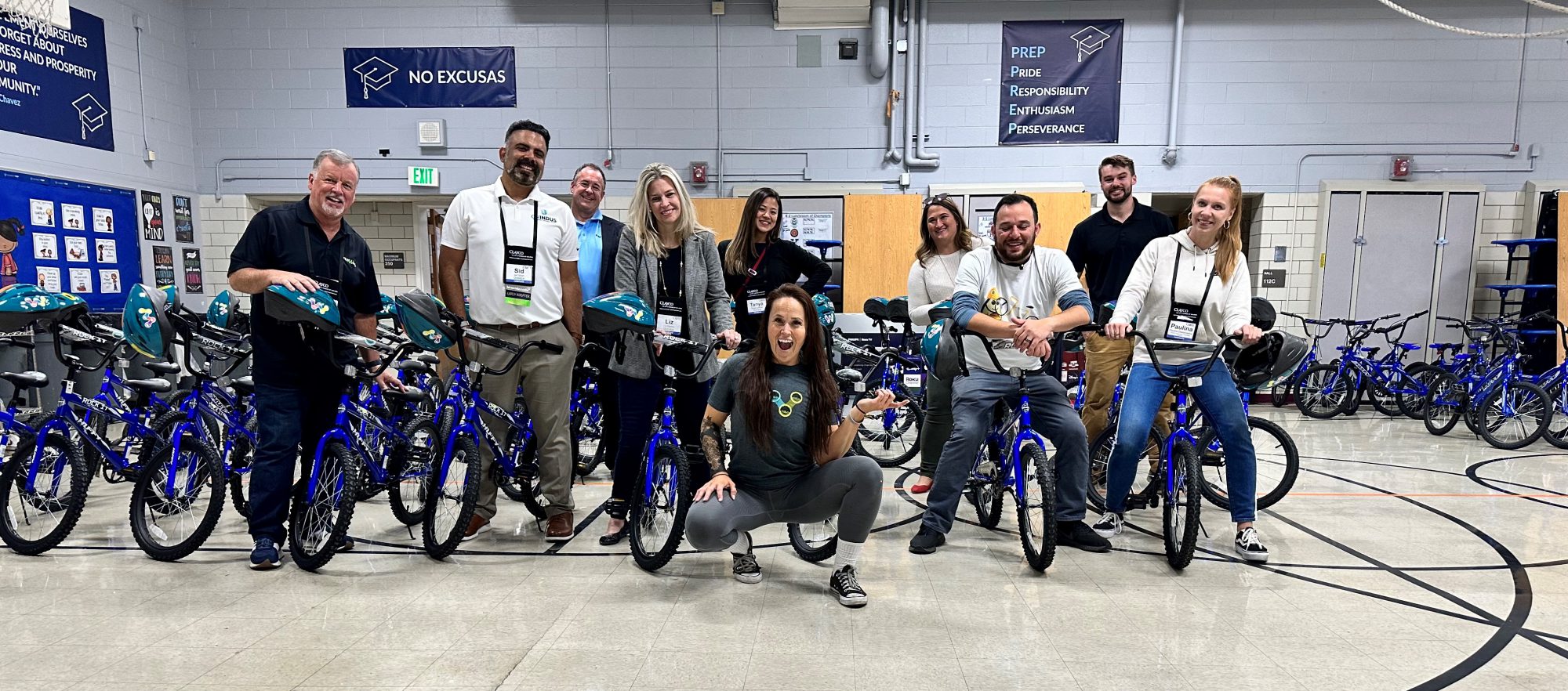 The COAA Builds 64 Bikes and PMWeb Donates a Smart TV to the University Prep School and Students in Denver