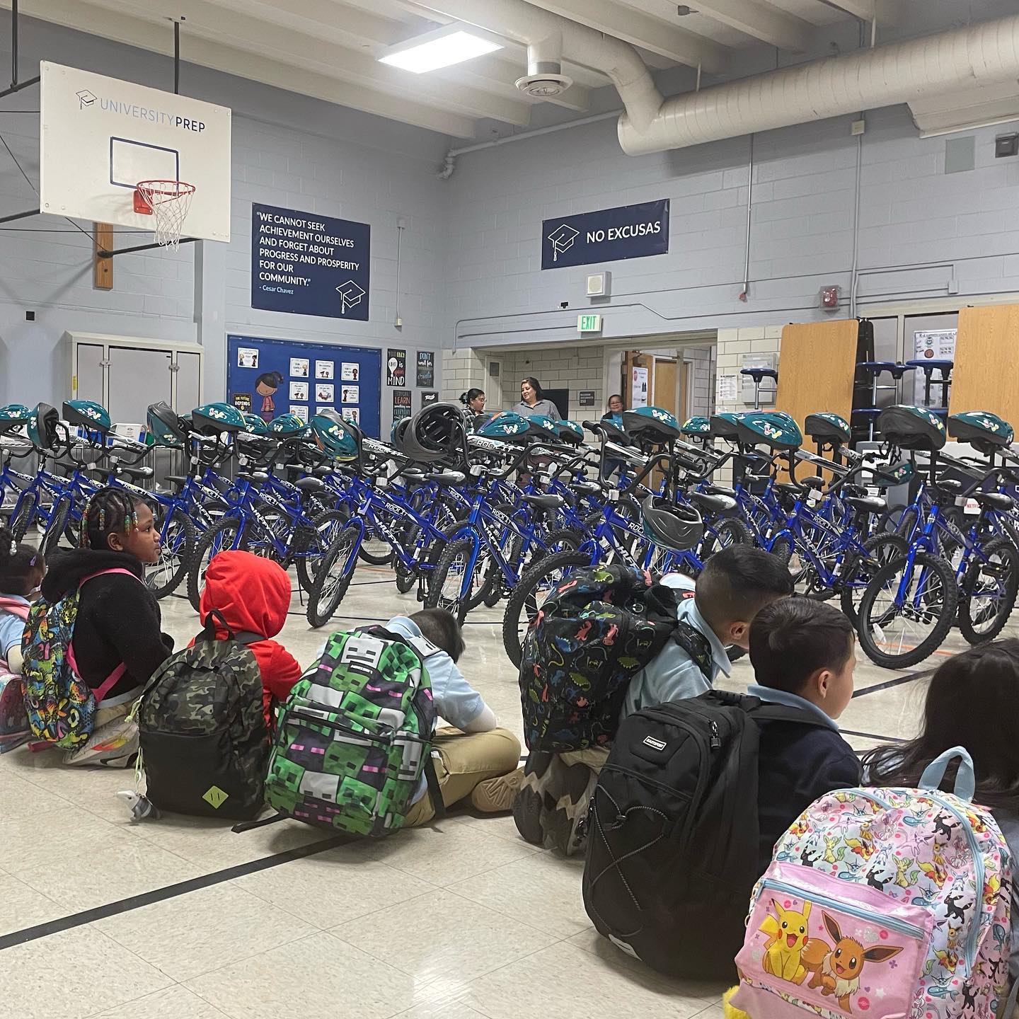 The second grade students at University Prep are excited to receive their new bikes.